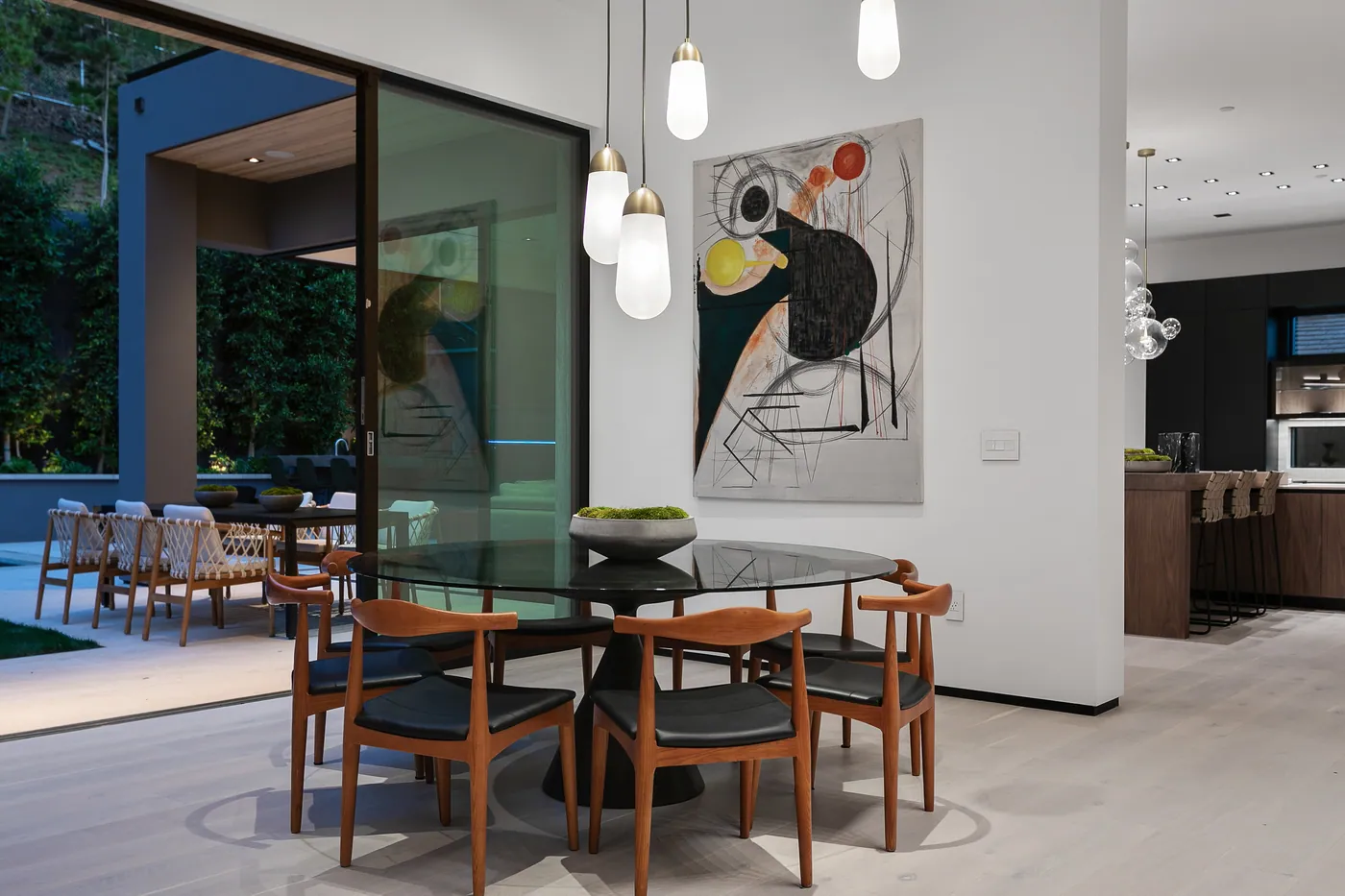 Dining room with a round glass table