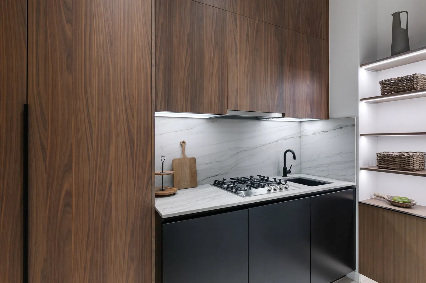 Kitchen detail with walnut cabinetry