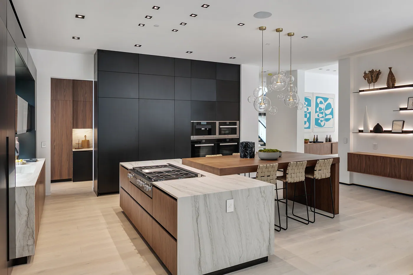 Kitchen island in marble and walnut
