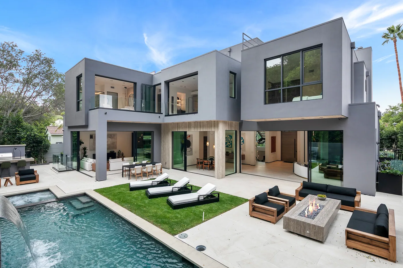 Rear facade, pool and lawn