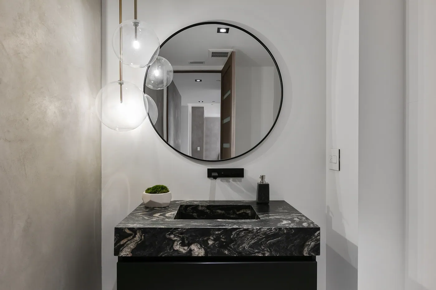 Powder room in black stone