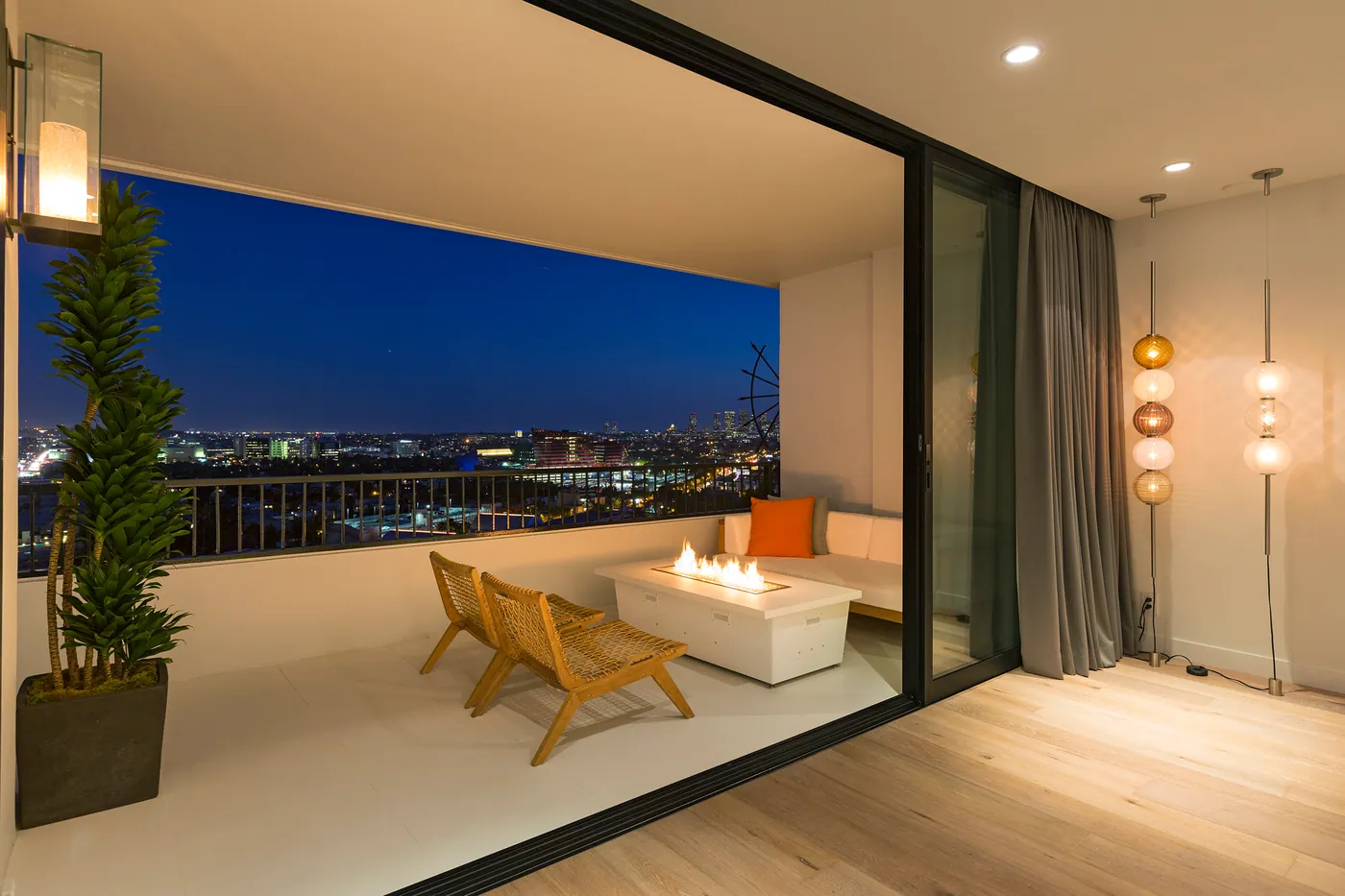 Alta Loma, West Hollywood: terrace with a fire table at night