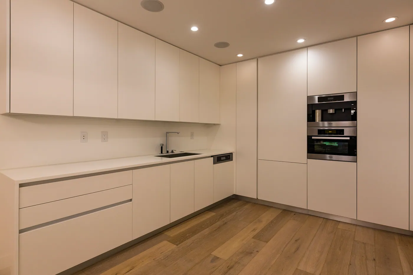 Kitchen with built-in appliances