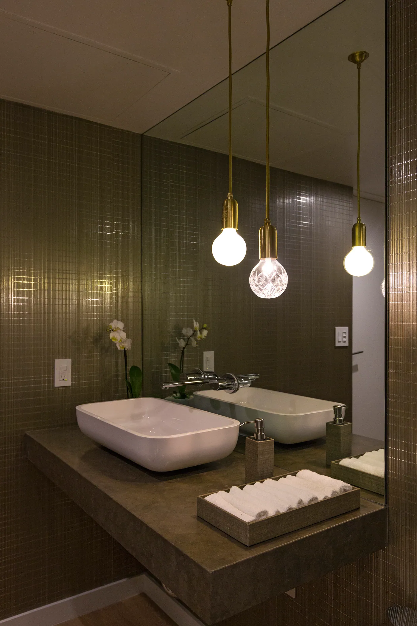Powder room vanity with pendant lights