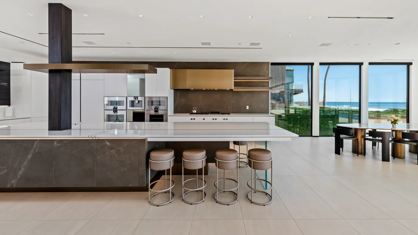 Kitchen with a long stone island