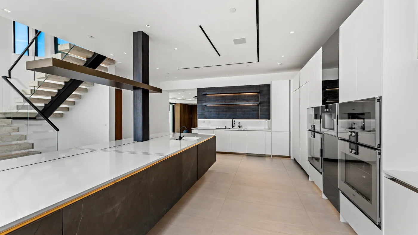 Kitchen and floating staircase