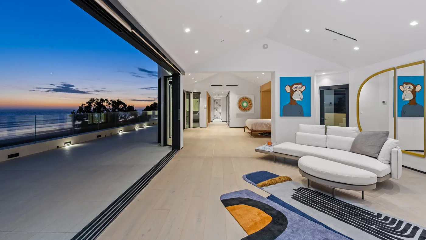 Primary suite opening to the sunset