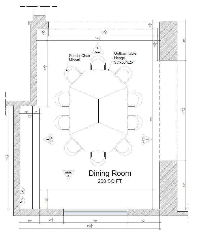 A dining room with a long table, panelled walls and a sculptural light