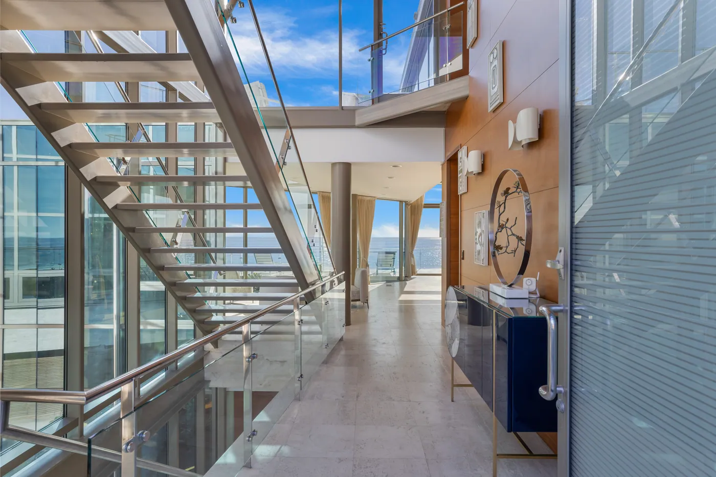 Glass staircase and gallery