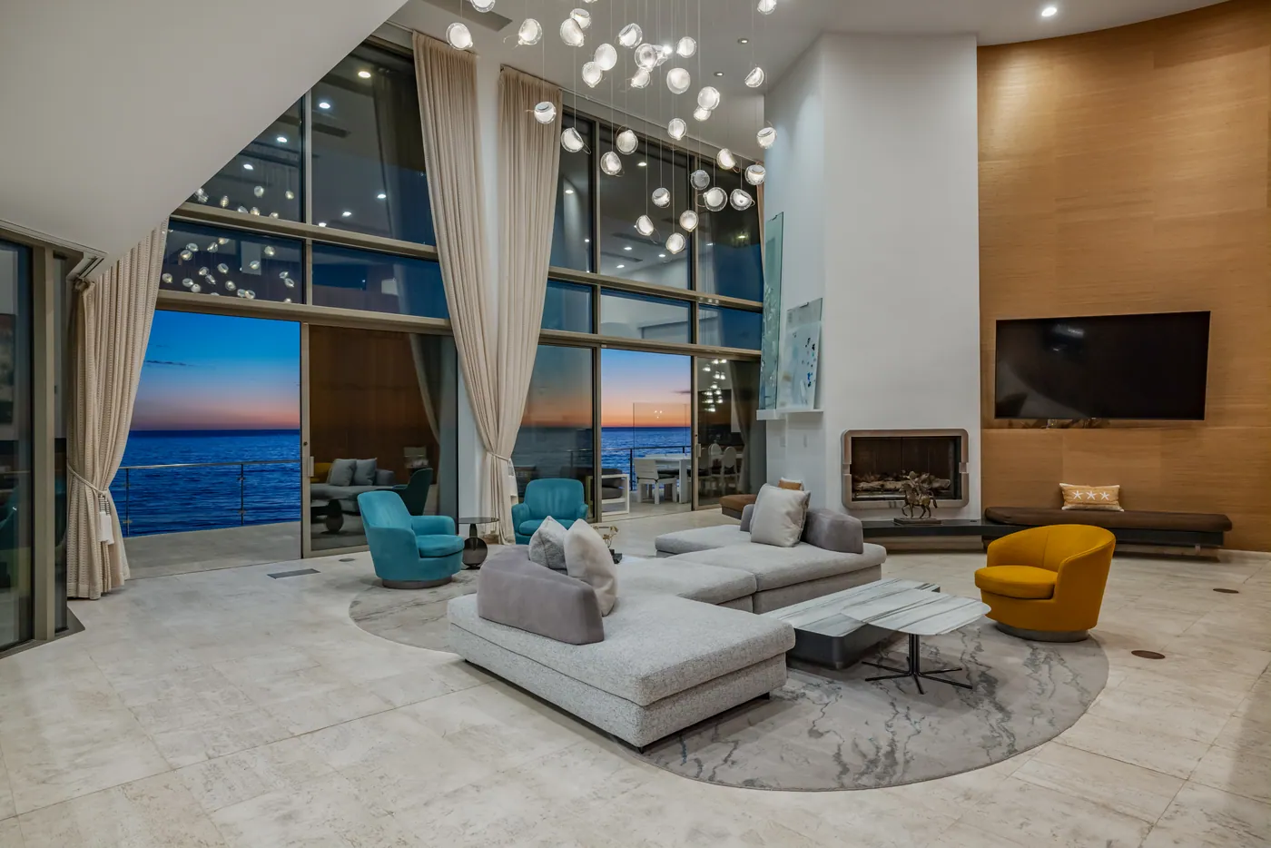 Living room with fireplace and walnut wall