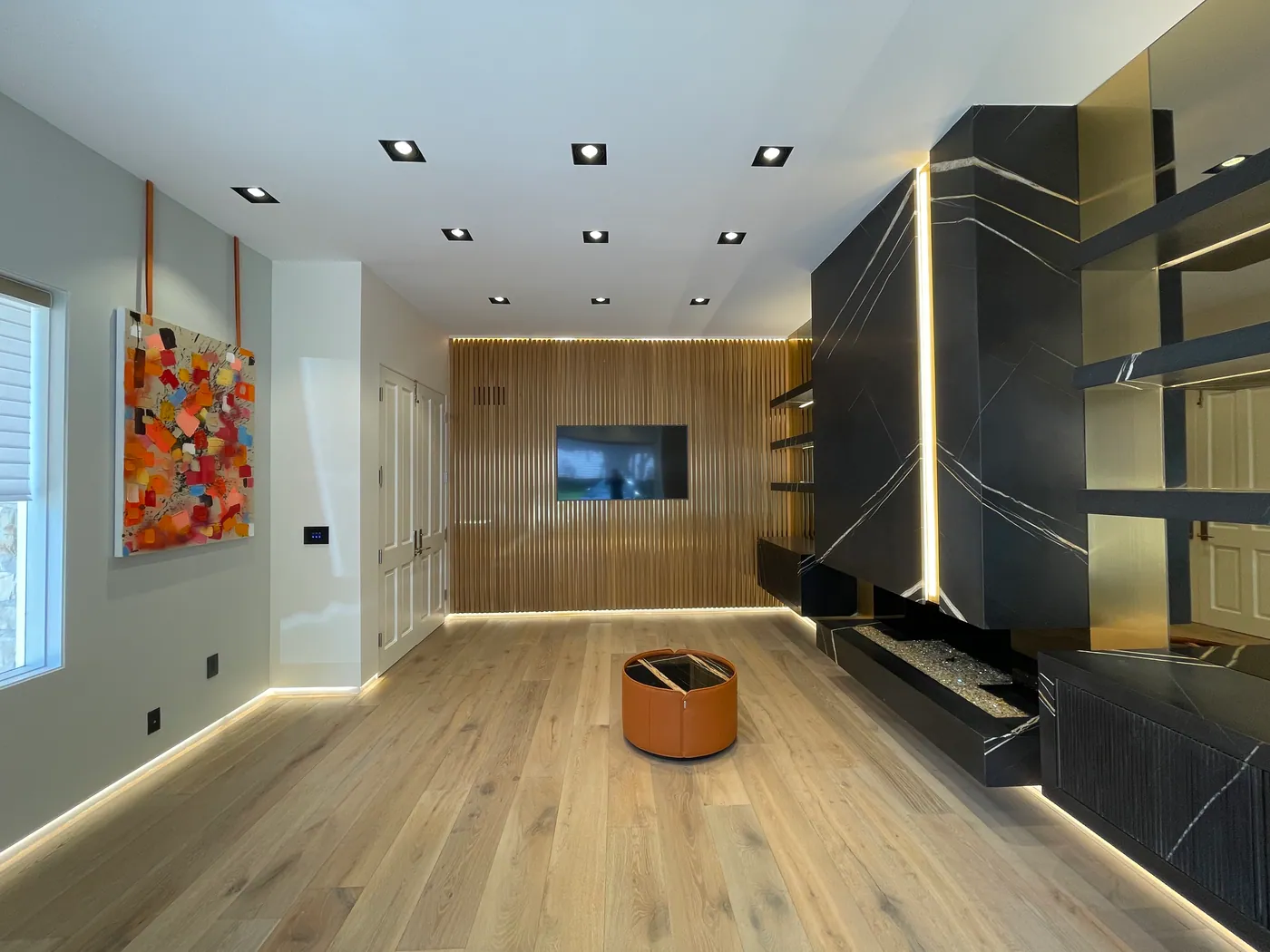 Media room with built-in shelving
