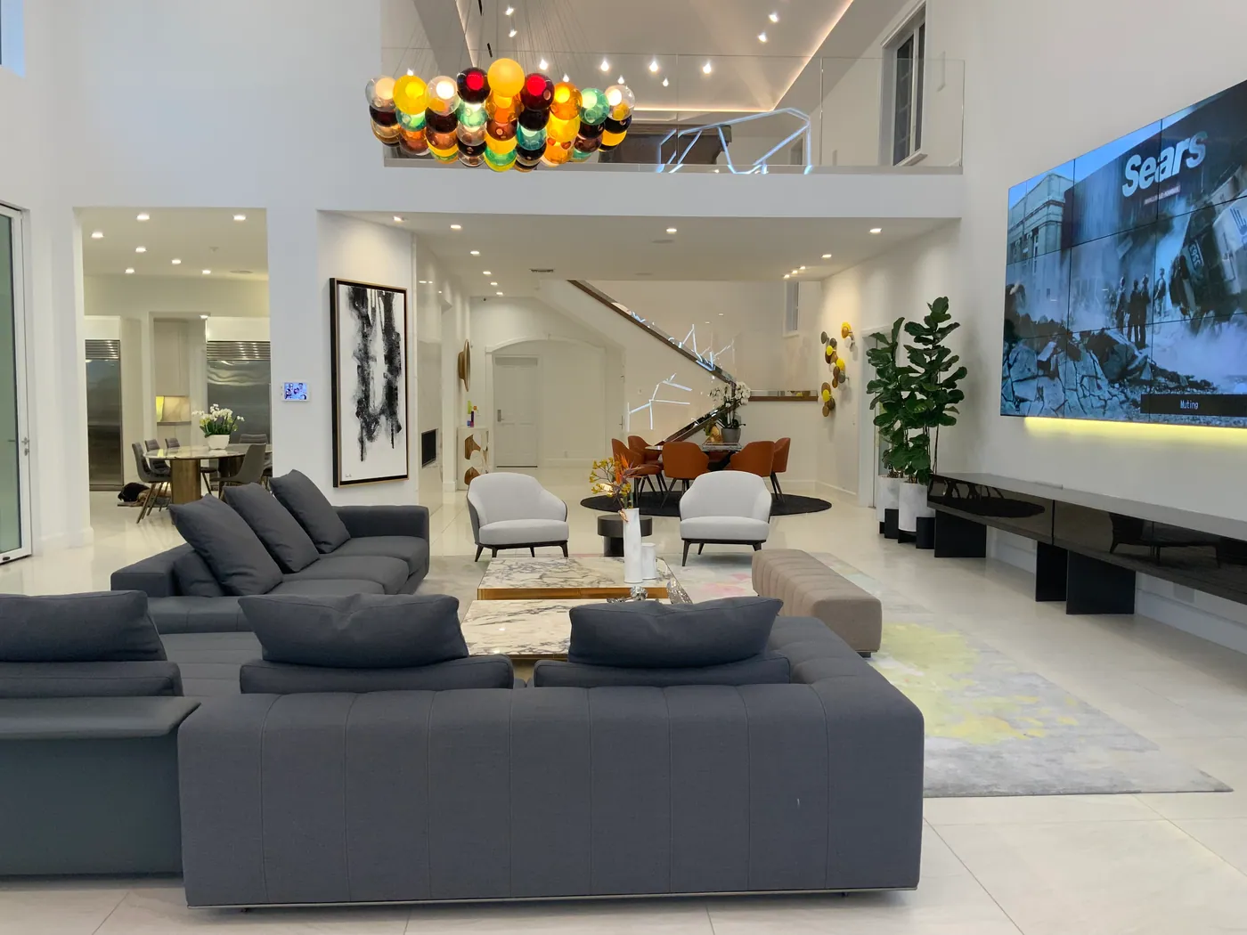 Great room with a glass chandelier