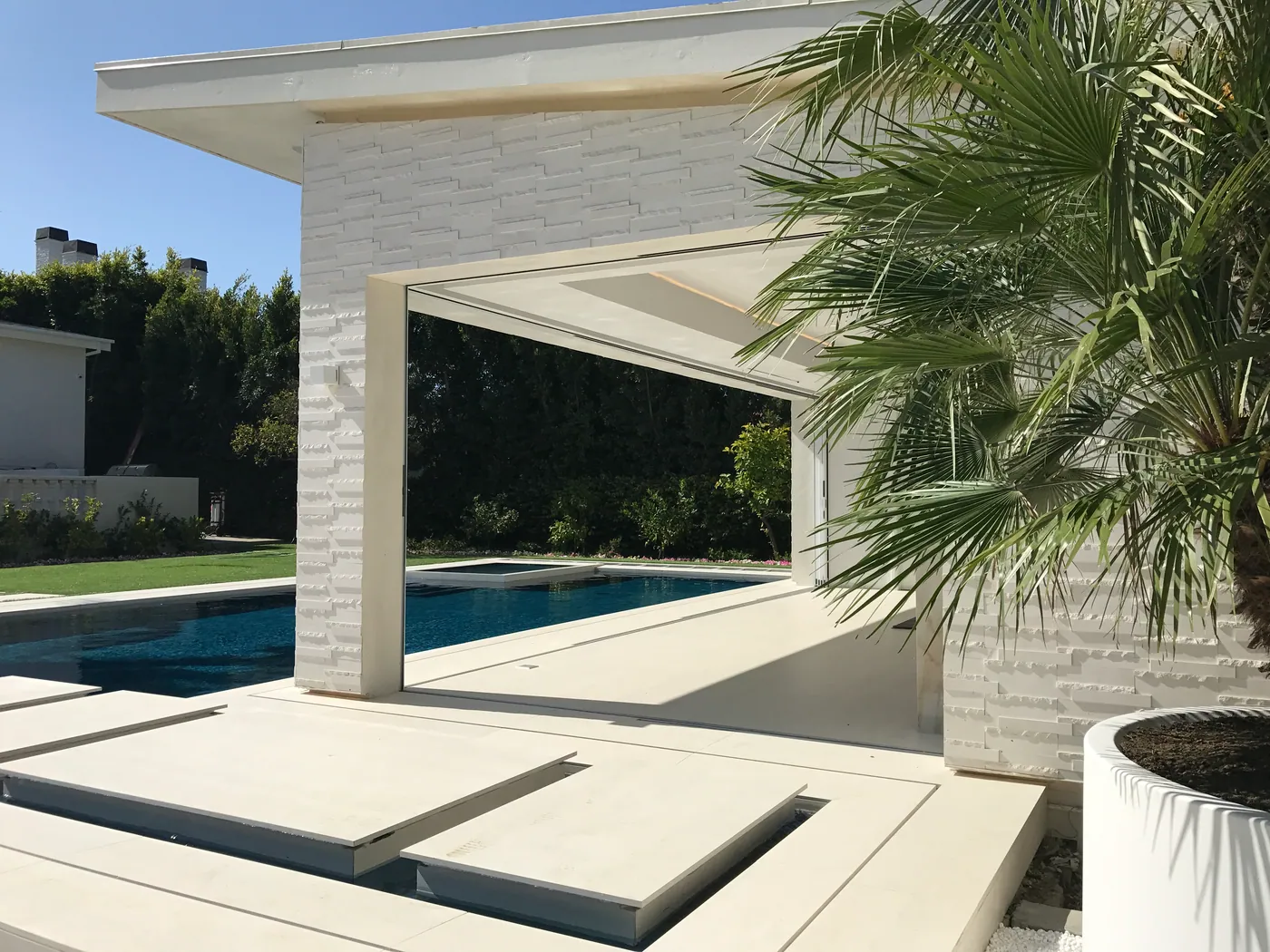 Pool house in stacked stone