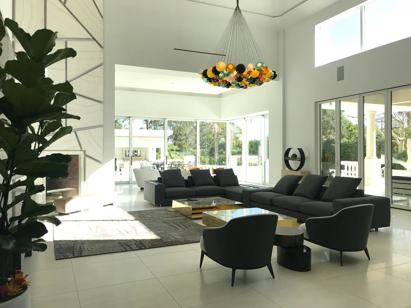 Great room under a glass chandelier