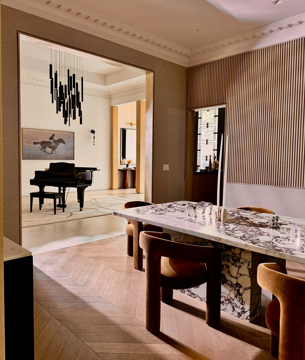 Dining room looking through to the foyer and piano