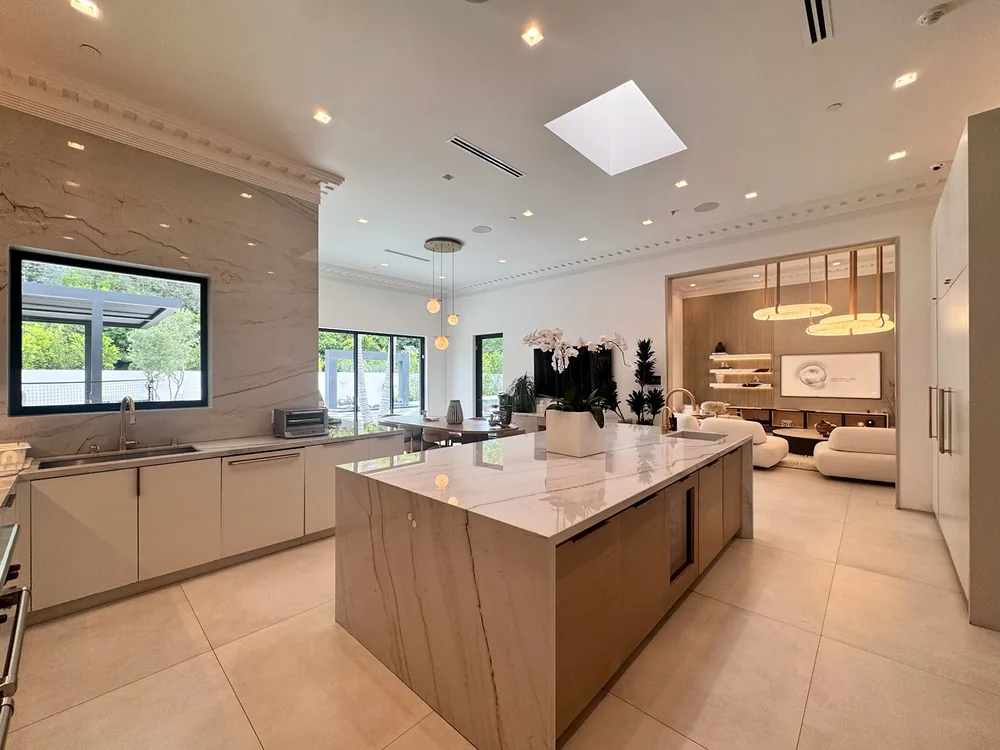 Kitchen island with the family room beyond