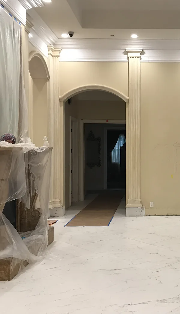 The arched opening into the hallway