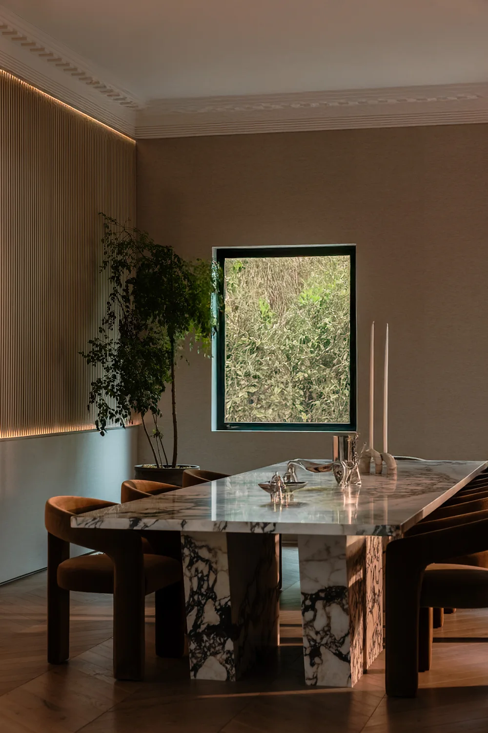 Dining room with a garden window and stone table