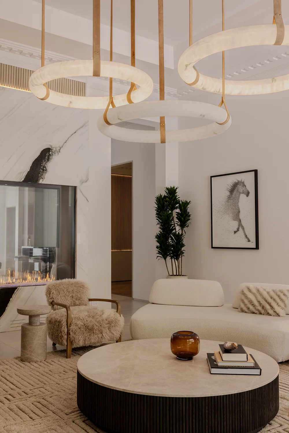 Living room seating around a round stone table