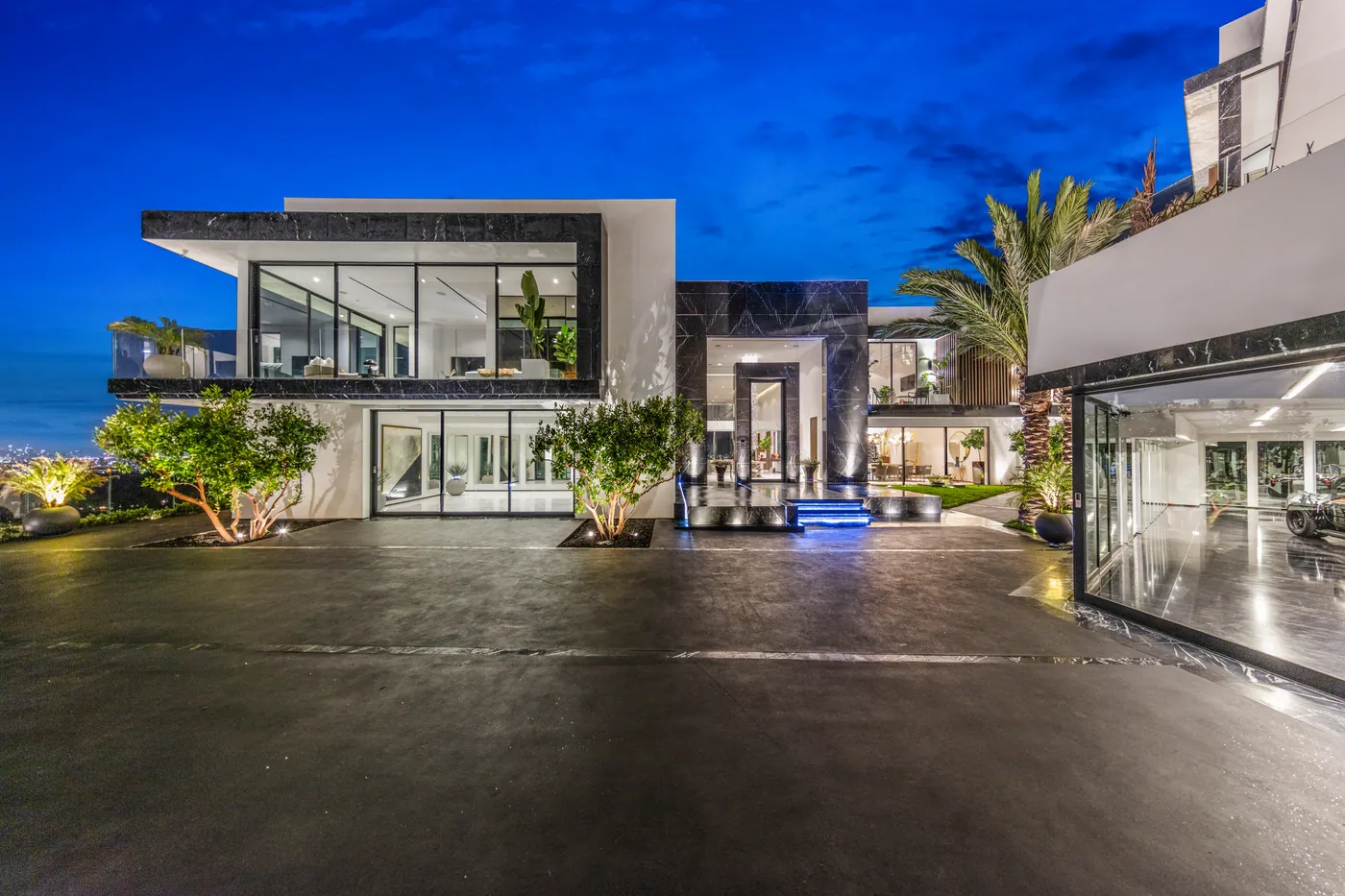 Motor court and front facade at blue hour