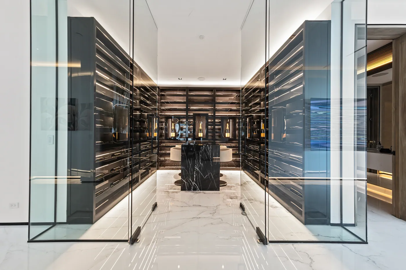 Glass-walled wine room off the main hall