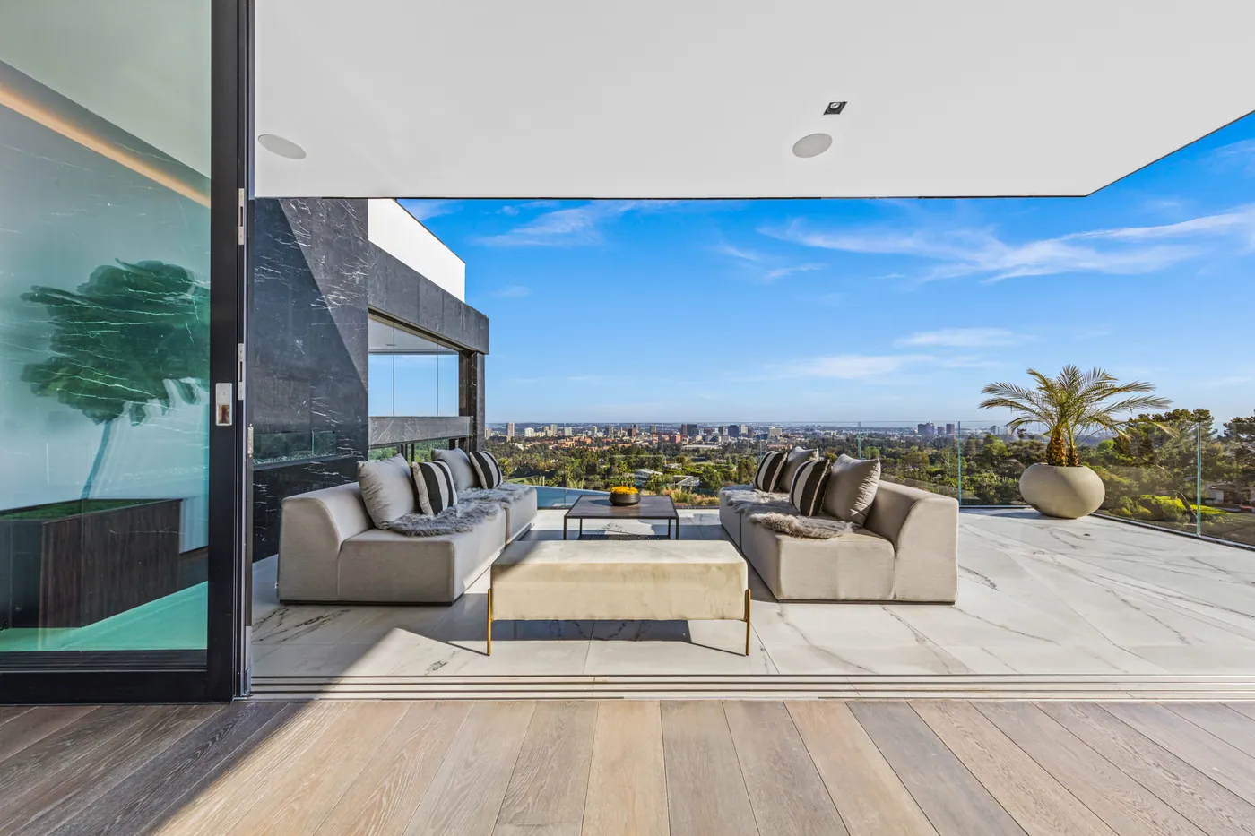 Covered terrace lounge overlooking Los Angeles