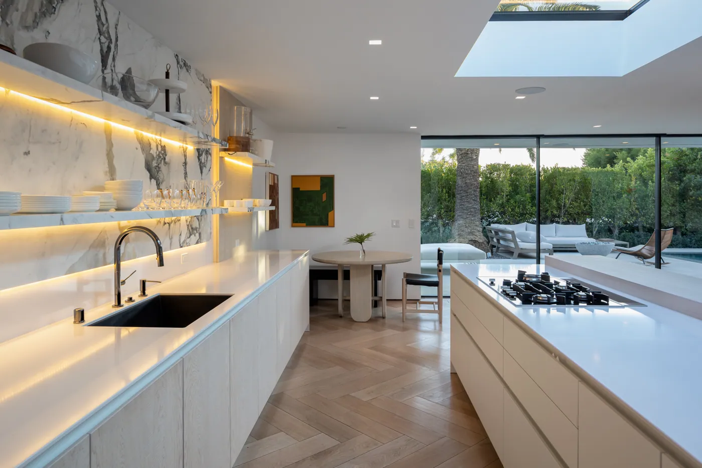 Kitchen in white stone with skylight