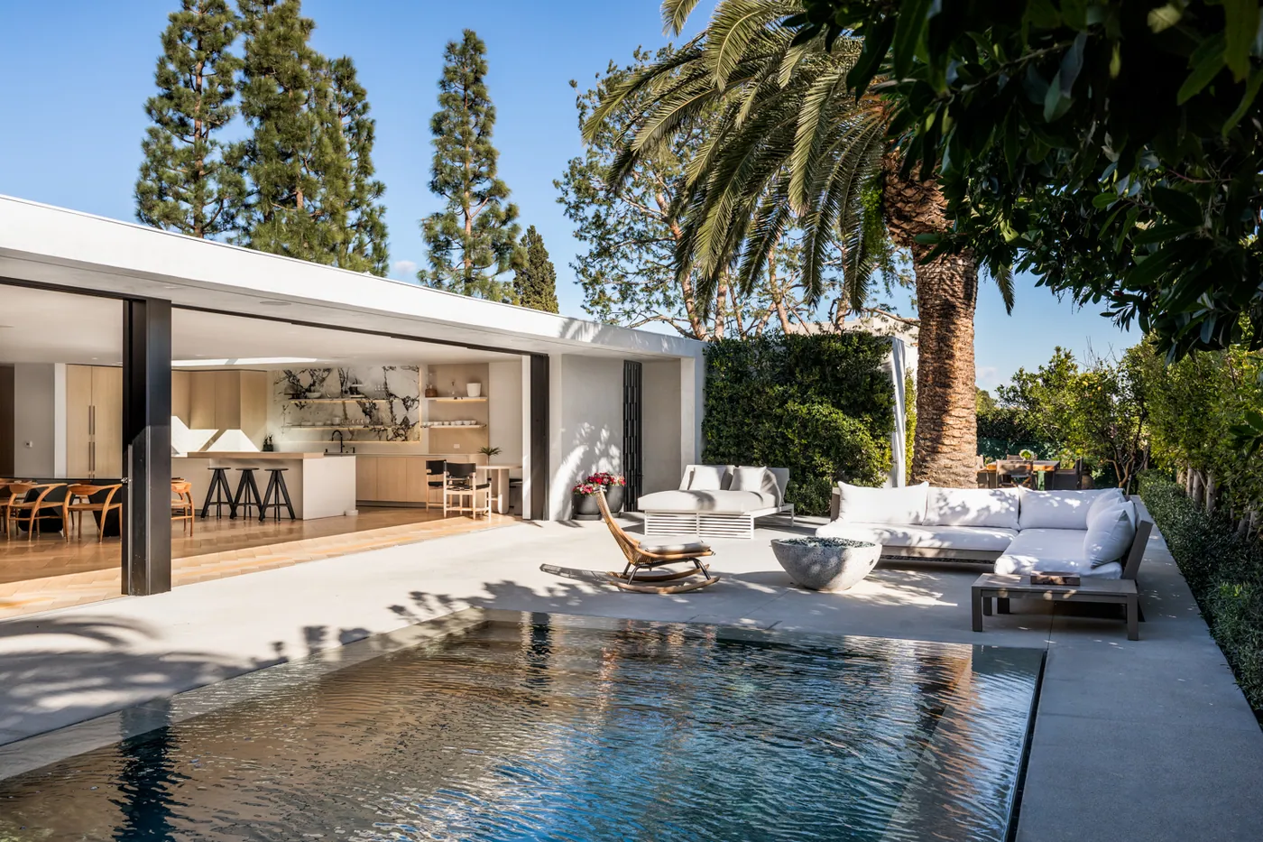 Pool and living spaces beyond