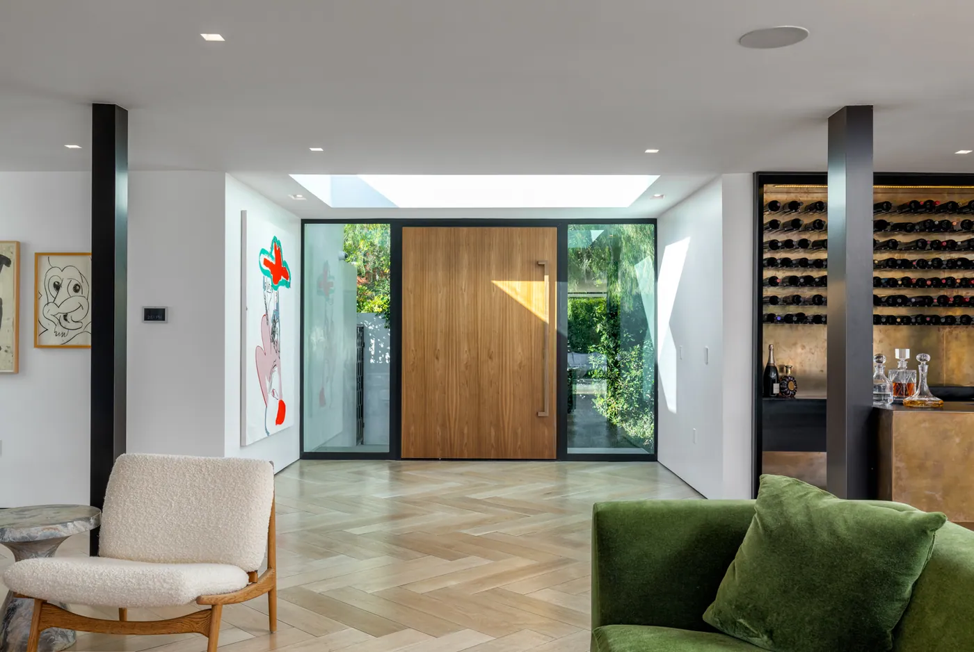 Entry with art and wine wall